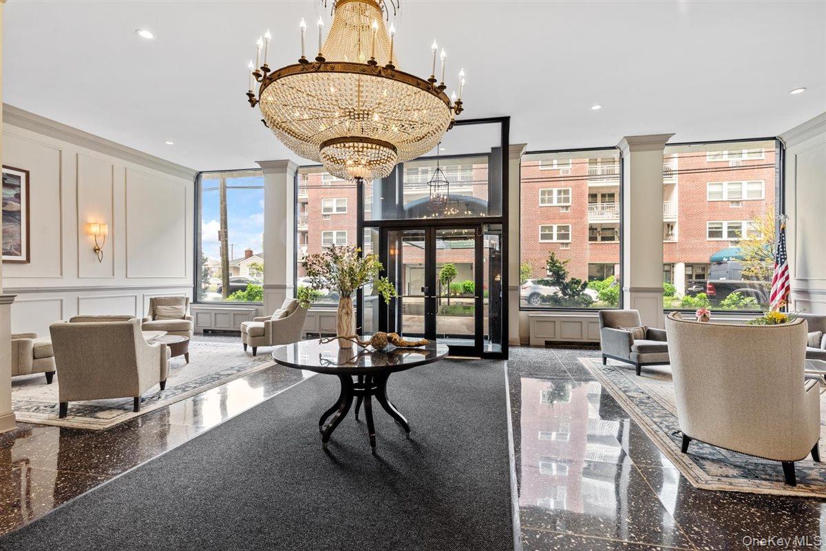 700 Shore Road, Unit 7Y Long Beach, NY 11561 - Photo 23 of 31 Building lobby featuring a decorative wall and recessed lighting