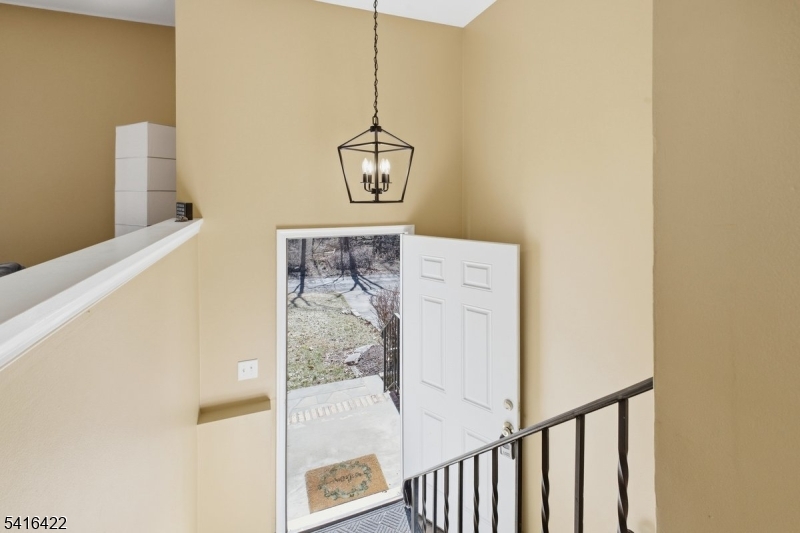 7 Summer Street Columbia, NJ 07832 - Photo 2 of 22 a view of a hallway with wooden floor and dining room