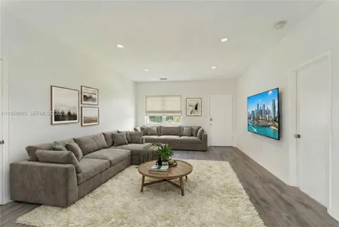 a living room with furniture and a couch