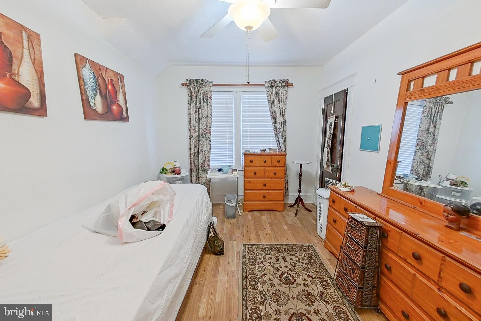 2803 Ruscombe Lane Baltimore, MD 21215 - Photo 15 of 28 a room with furniture and a rug