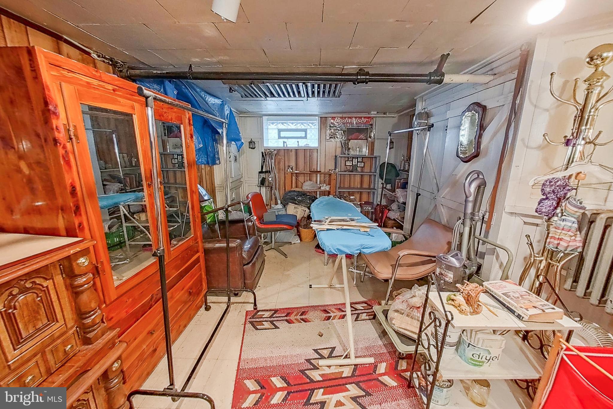 2803 Ruscombe Lane Baltimore, MD 21215 - Photo 20 of 28 a view of a chairs and table in a patio