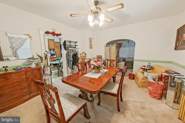 a kitchen with stainless steel appliances granite countertop a stove and cabinets