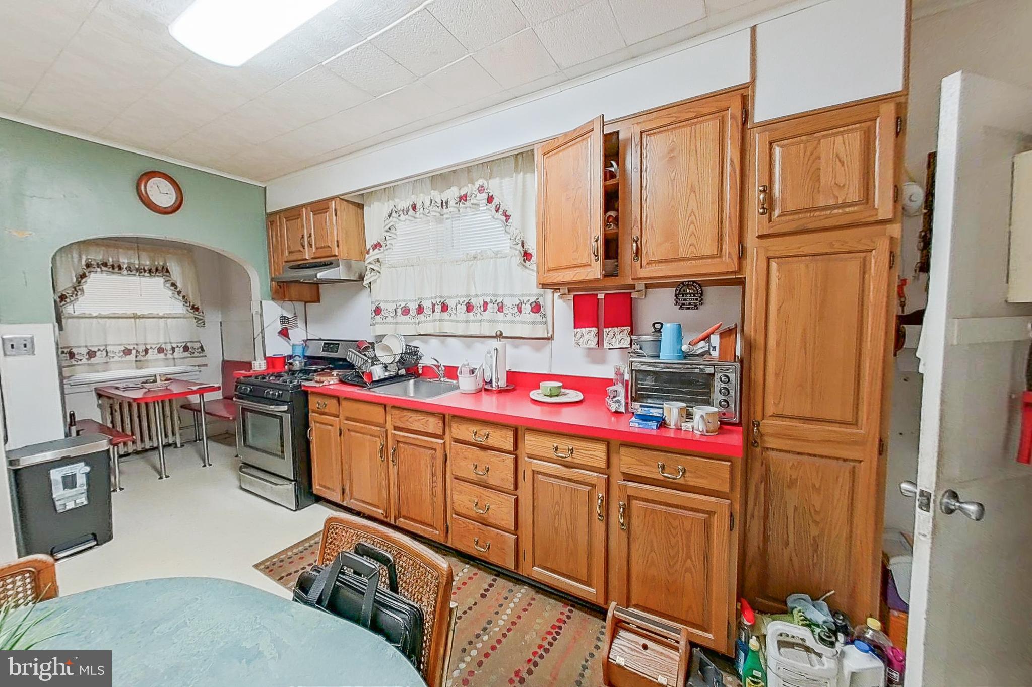 2803 Ruscombe Lane Baltimore, MD 21215 - Photo 10 of 28 a room with musical instruments and air hockey table