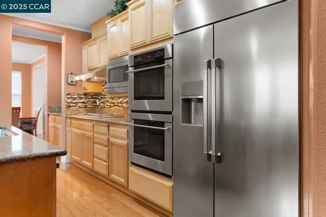 a bathroom with a stove and a shower