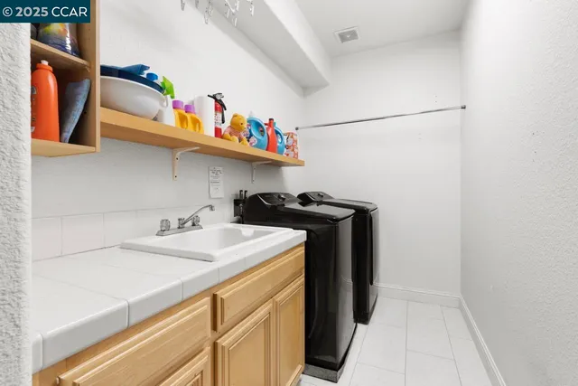 a backyard of a house with outdoor seating