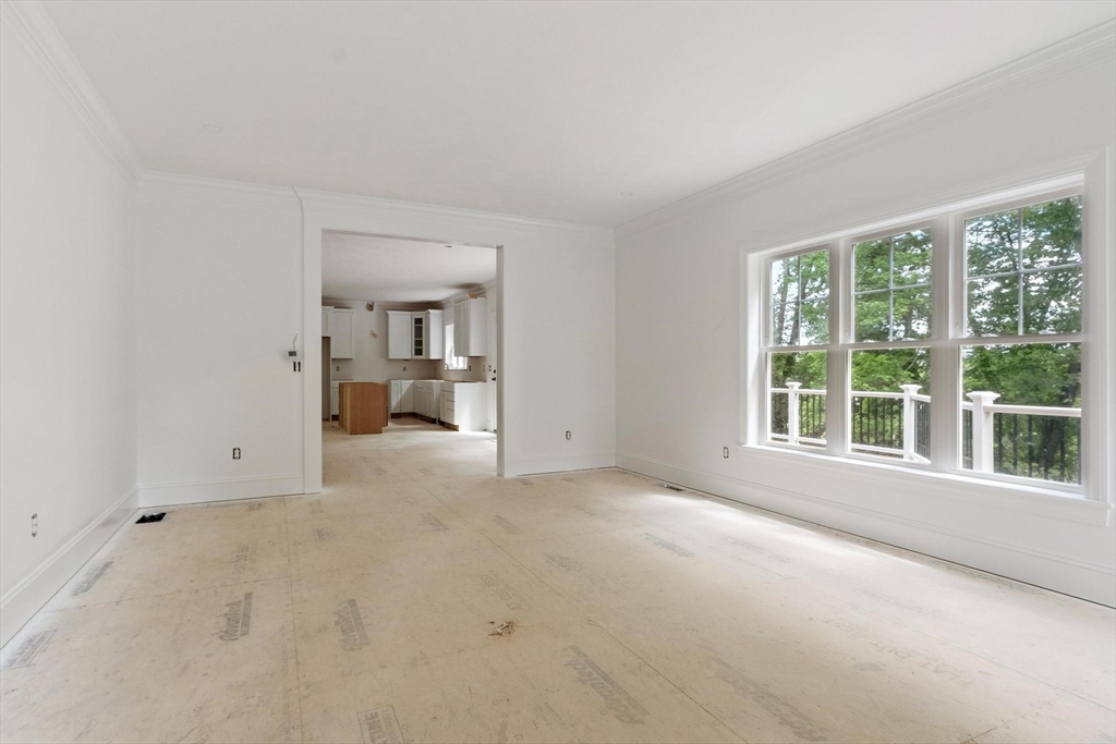 37 Dogwood Road Littleton, MA 01460 - Photo 16 of 36 an empty room with a window and fire pit