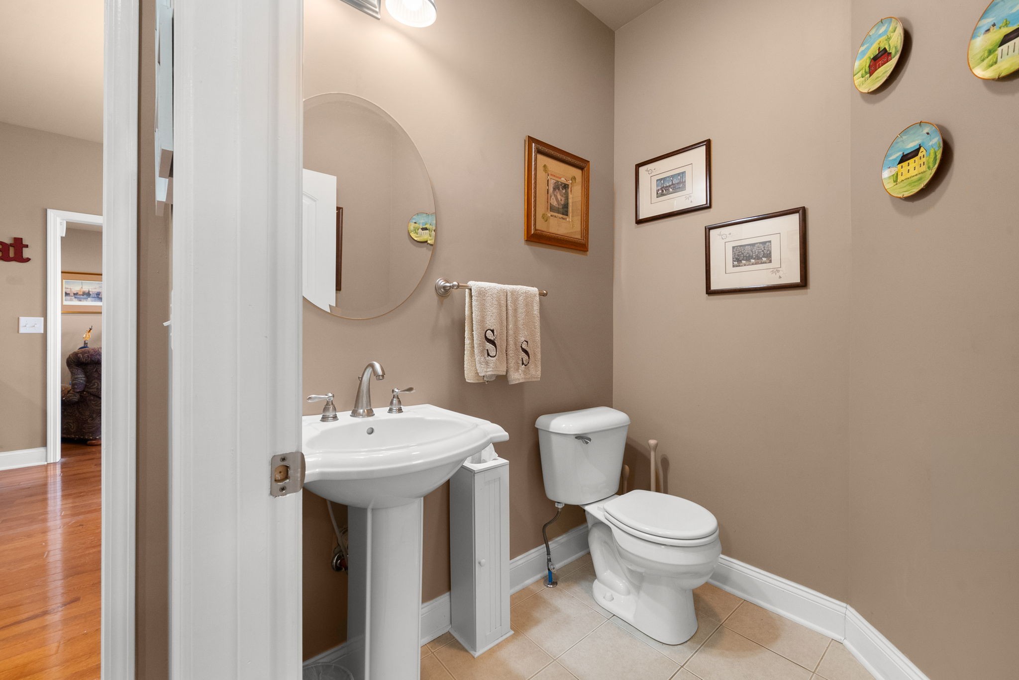 4940 Marion Road Cunningham, TN 37052 - Photo 16 of 43 a bathroom with a toilet a sink and a mirror