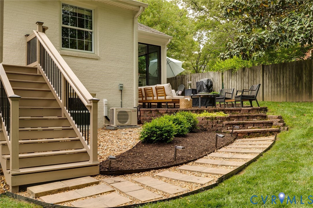 3630 Wakefield Road Richmond, VA 23235 - Photo 41 of 46 New deck leads to the hardscaped patio.