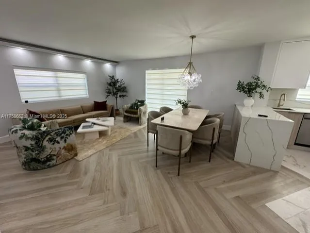 a living room with furniture and window