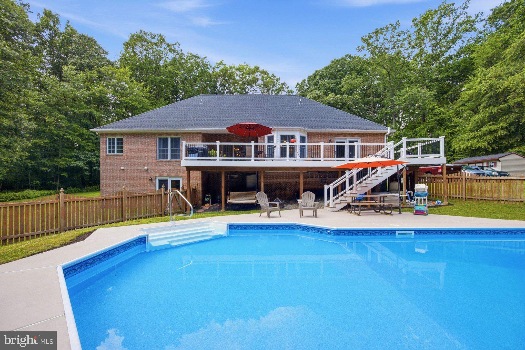 3723 Bay Road Street, MD 21154 - Photo 2 of 49 Huge composite deck leads to private pool deck