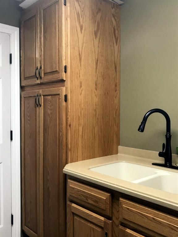 125 Heinz Road Butler, PA 16001 - Photo 7 of 23 PANTRY OFF OF KITCHEN IN LAUNDRY ROOM. WITH SINK.
