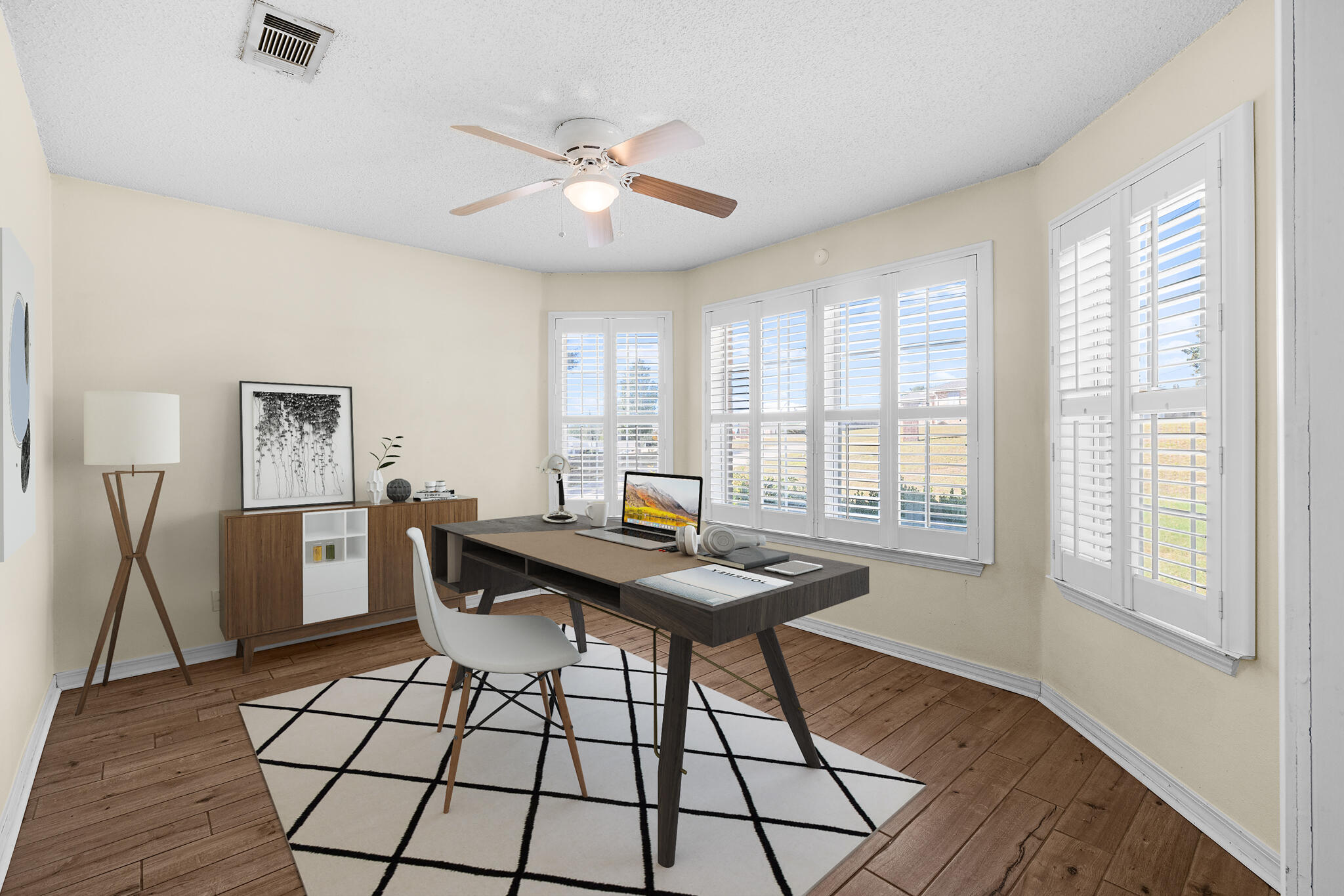 233 Lustan Drive Crestview, FL 32536 - Photo 13 of 22 a view of a workspace with furniture and window