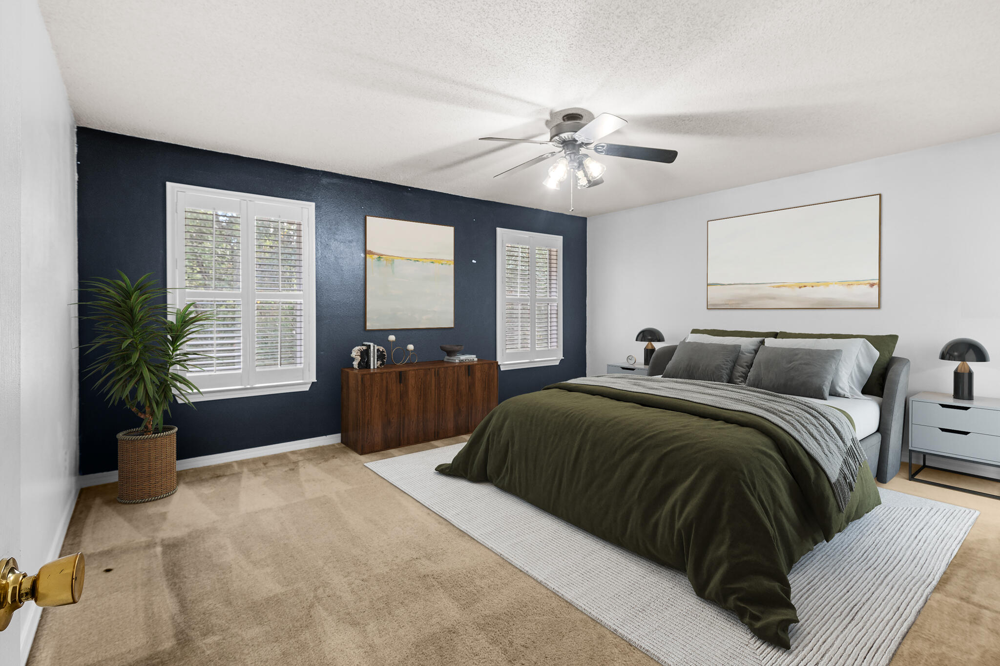 233 Lustan Drive Crestview, FL 32536 - Photo 14 of 22 a spacious bedroom with a bed and a chandelier