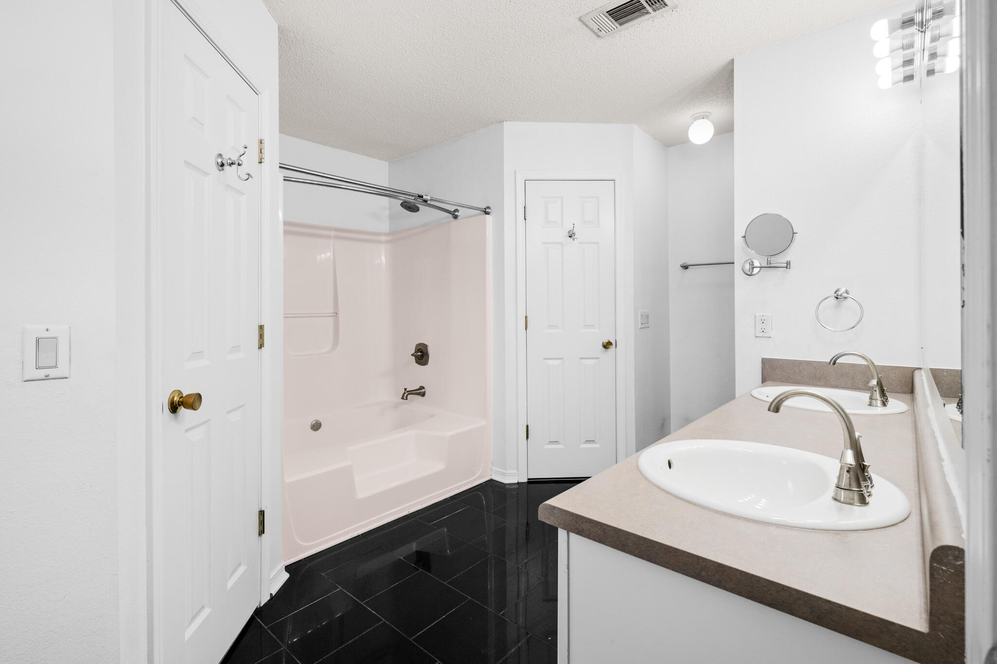 233 Lustan Drive Crestview, FL 32536 - Photo 15 of 22 a bathroom with a sink and a mirror