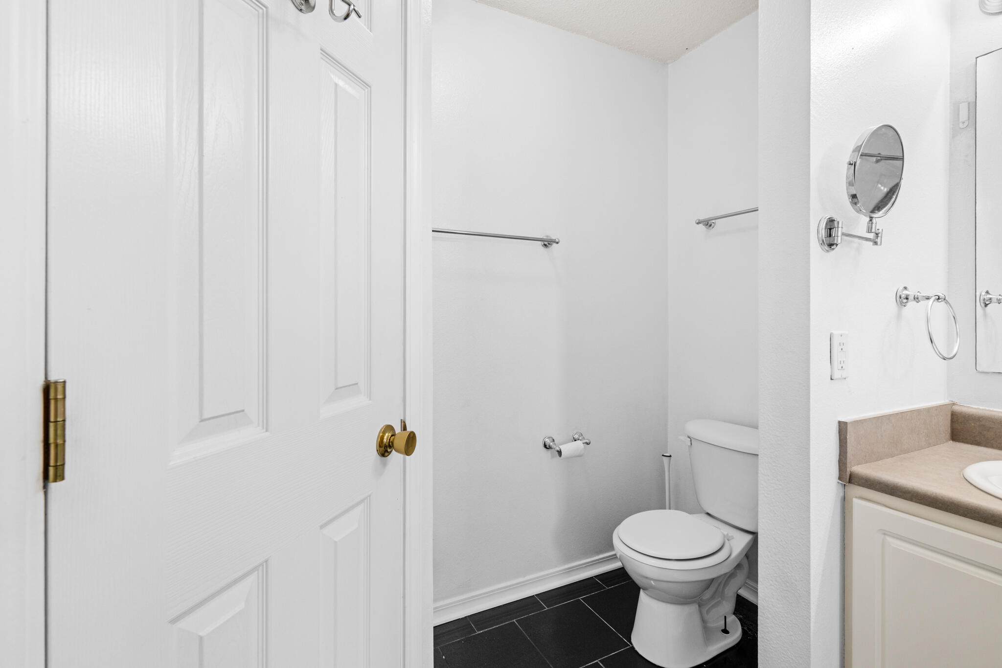 233 Lustan Drive Crestview, FL 32536 - Photo 16 of 22 a white toilet sitting next to a shower