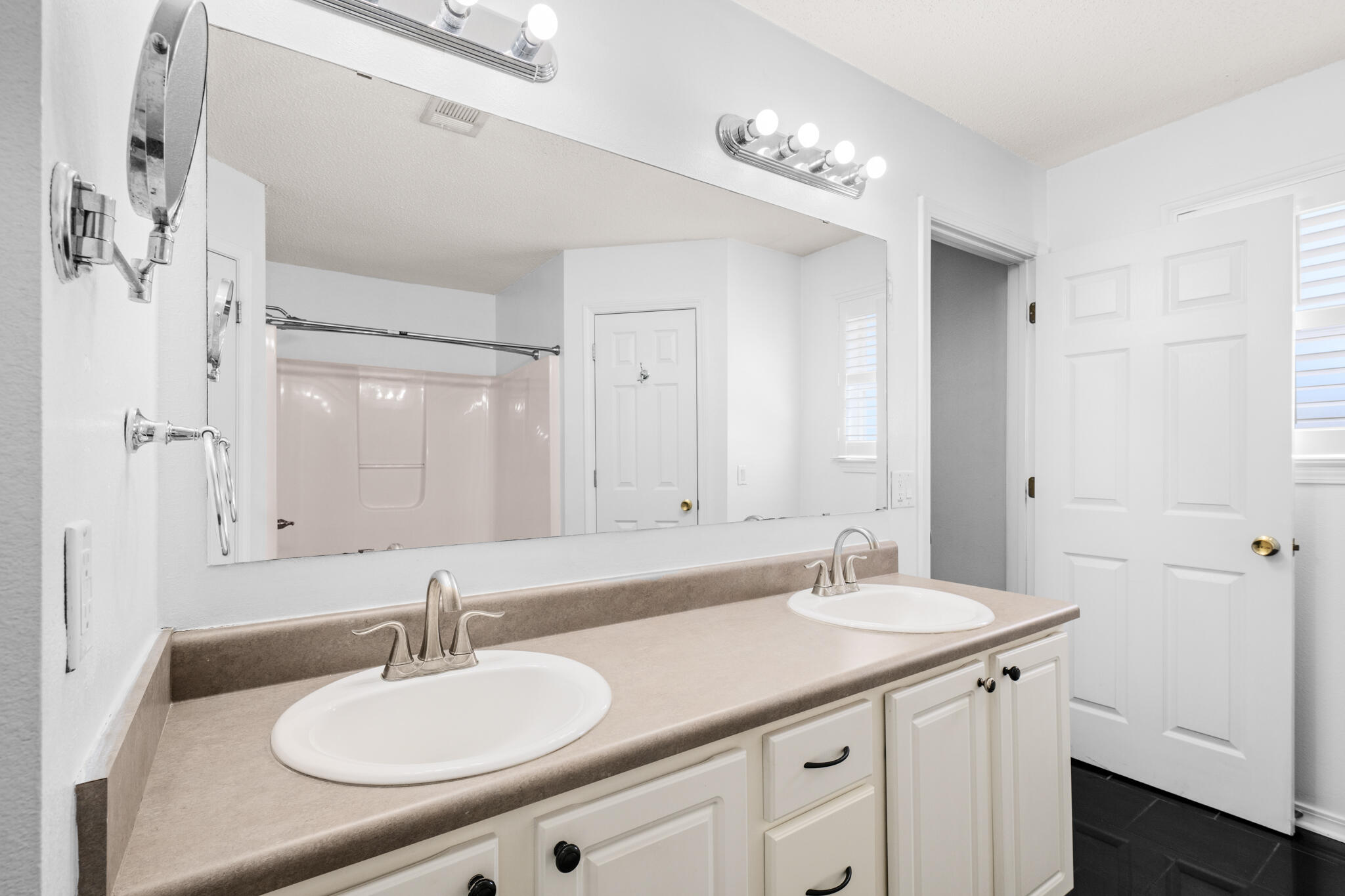 233 Lustan Drive Crestview, FL 32536 - Photo 17 of 22 a bathroom with a sink double vanity and a mirror