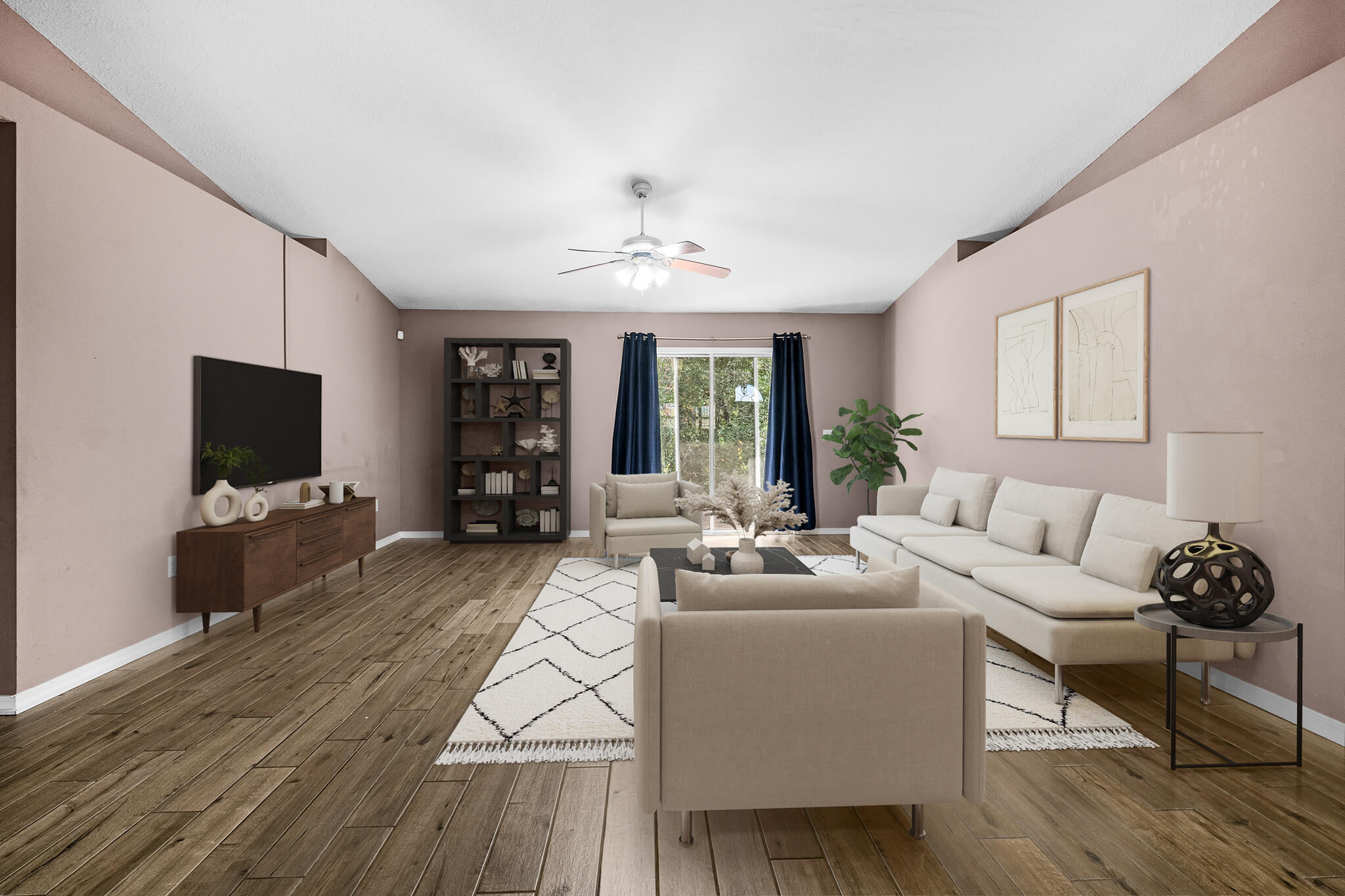 233 Lustan Drive Crestview, FL 32536 - Photo 10 of 22 a living room with furniture a flat screen tv and wooden floor