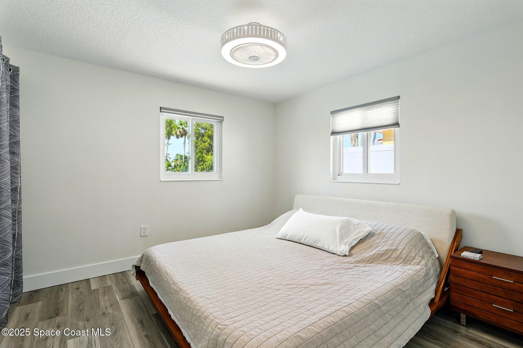 135 Richland Avenue Merritt Island, FL 32953 - Photo 23 of 24 a bedroom with a bed and a window