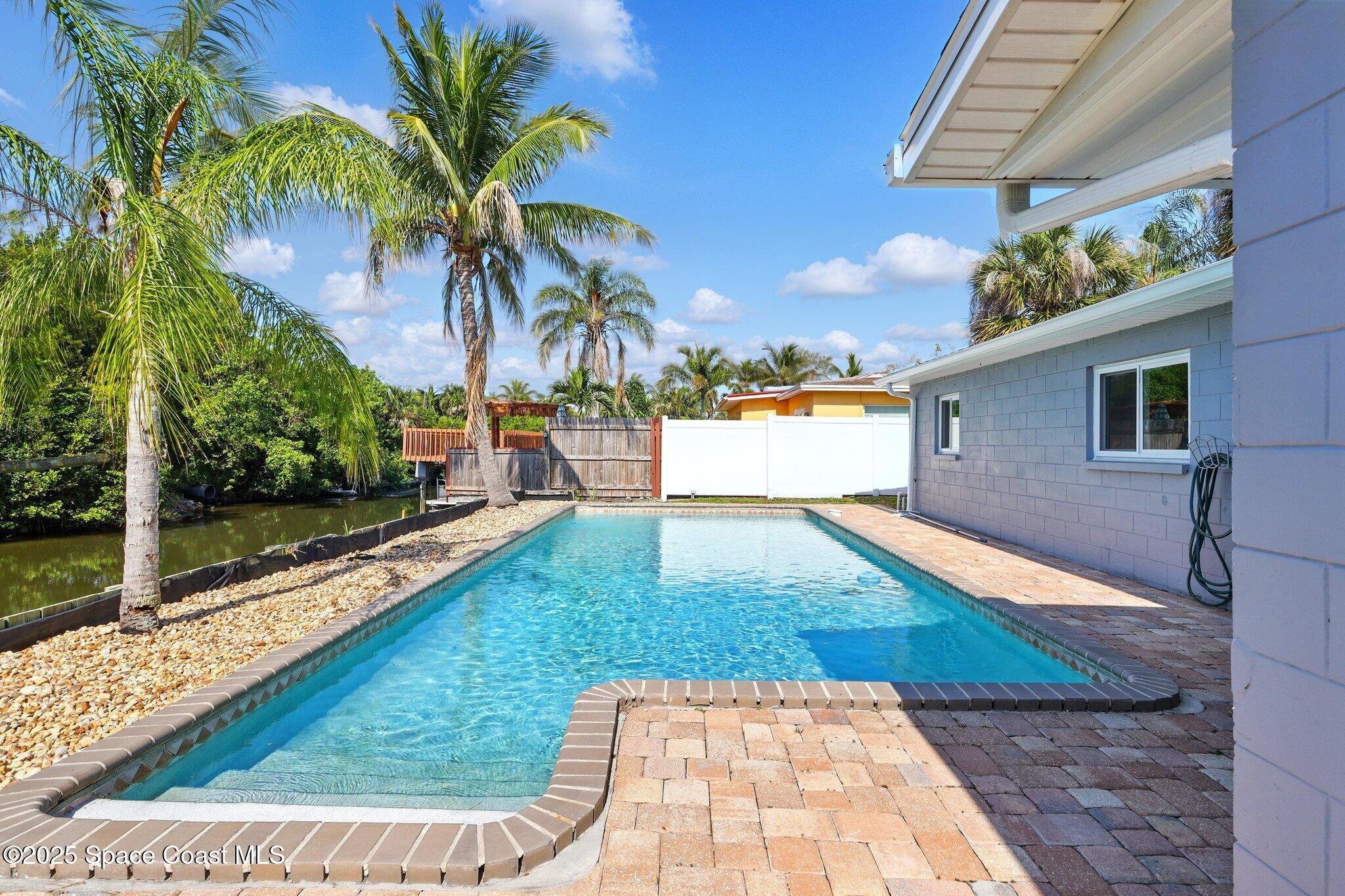 135 Richland Avenue Merritt Island, FL 32953 - Photo 8 of 24 a view of outdoor space with swimming pool