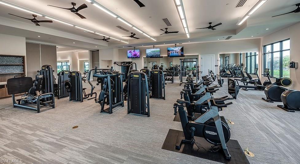 15335 Lucerna Street, Unit 104 Naples, FL 34114 - Photo 42 of 44 a view of a room with gym equipment