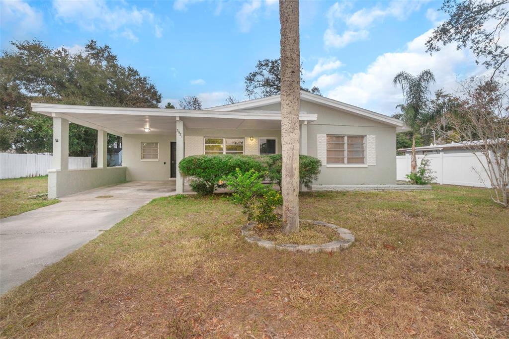5931 Pine Street New Port Richey, FL 34652 - Photo 1 of 1 front view of a house with a yard