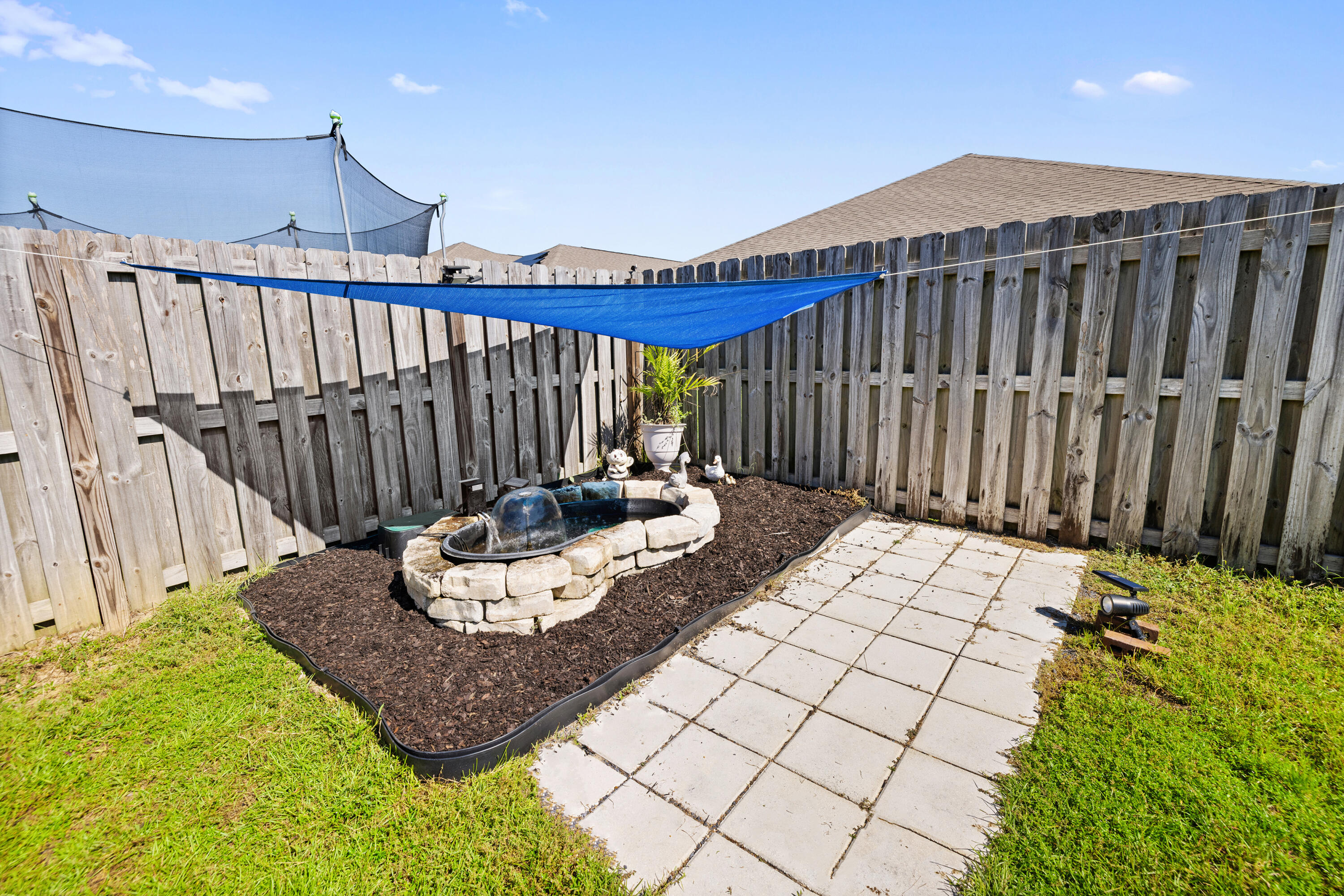 1016 Limpkin Street Crestview, FL 32539 - Photo 12 of 60 a view of a deck with furniture