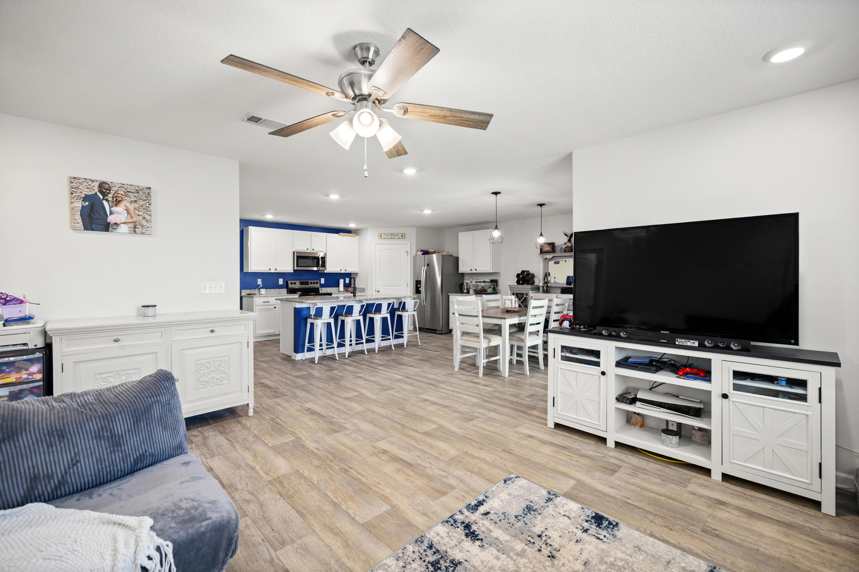 1016 Limpkin Street Crestview, FL 32539 - Photo 28 of 60 a living room with furniture and a flat screen tv