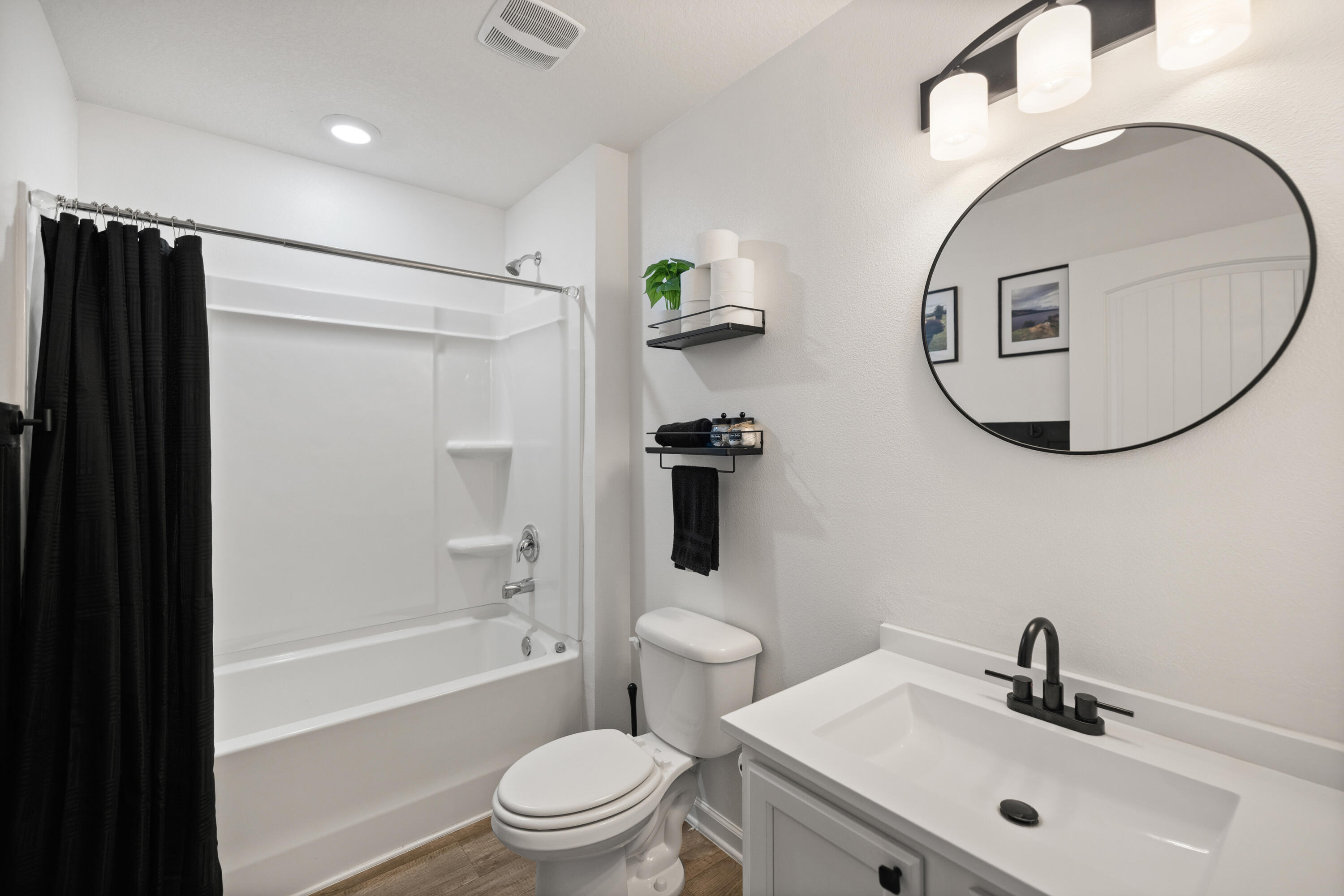 1016 Limpkin Street Crestview, FL 32539 - Photo 38 of 60 a bathroom with a sink toilet and shower