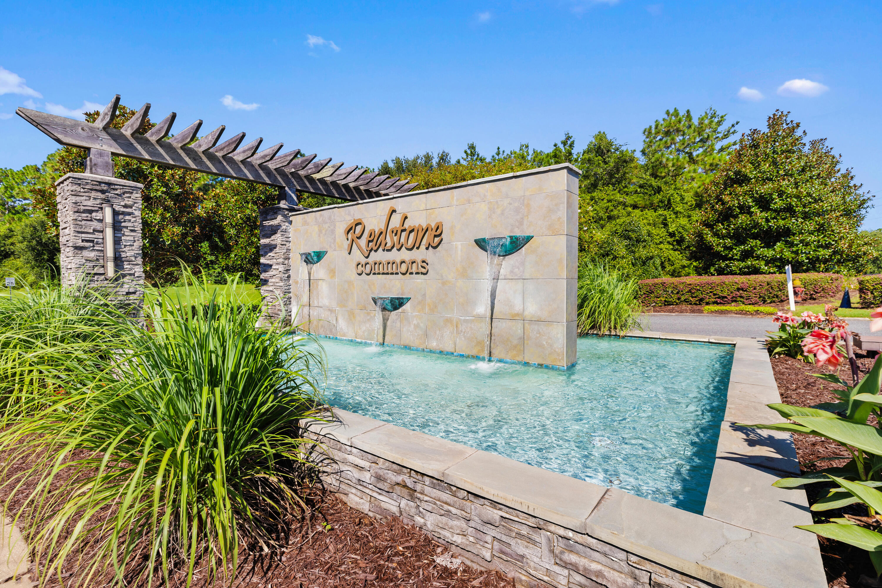 1016 Limpkin Street Crestview, FL 32539 - Photo 47 of 60 a view of a sign board with yard