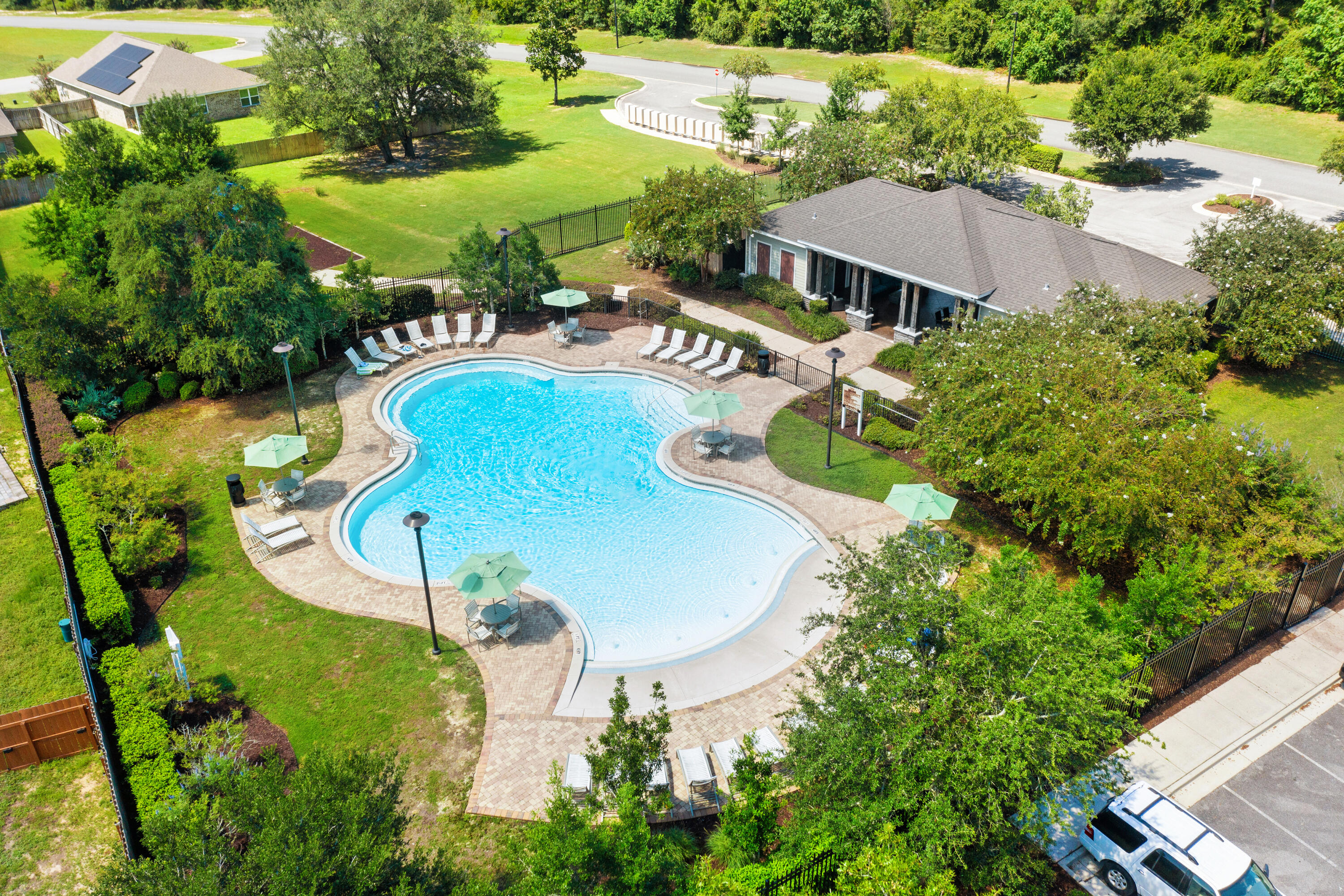 1016 Limpkin Street Crestview, FL 32539 - Photo 48 of 60 an aerial view of a house with outdoor space and pool