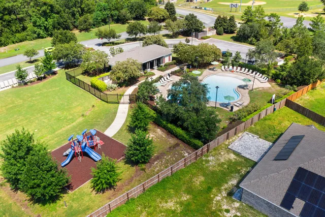 a view of grassy field with trees