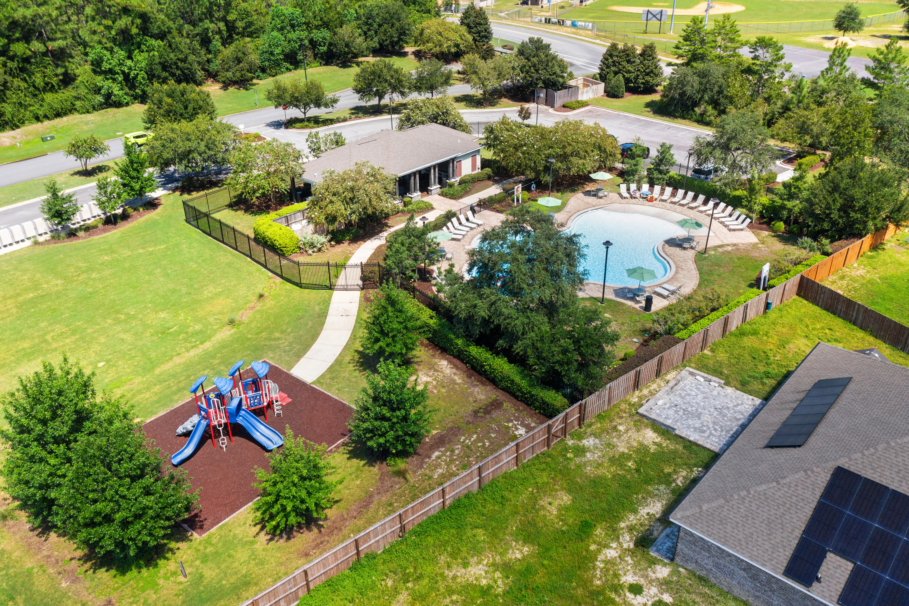 1016 Limpkin Street Crestview, FL 32539 - Photo 49 of 60 an aerial view of a house with a yard and outdoor seating