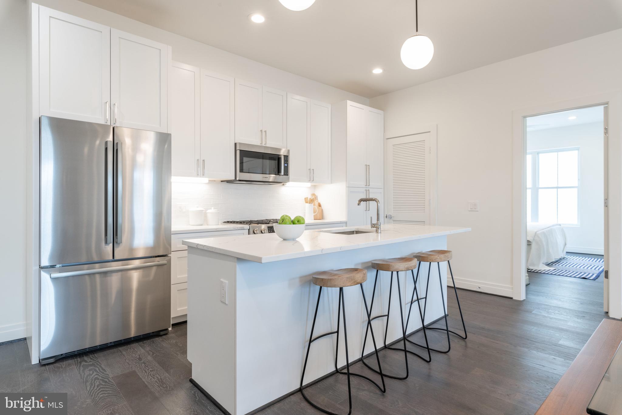 770 Park Road Northwest, Unit 301 Washington, DC 20010 - Photo 5 of 21 Pictures Reflect Unit 201: Stunning kitchen
