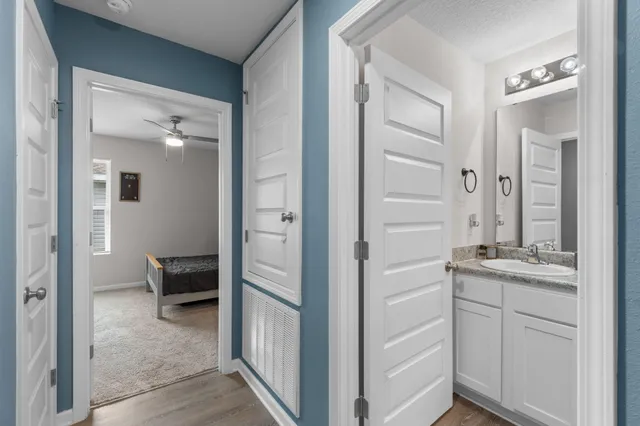 a bedroom with a workspace