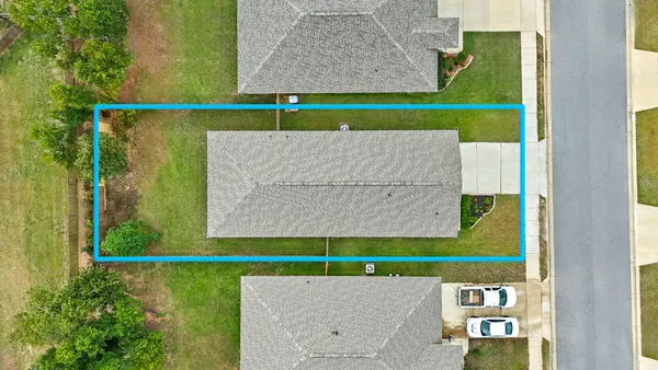 a view of a park with welcome board