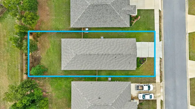 a view of a park with welcome board