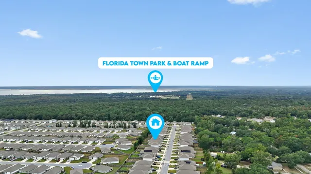 a view of outdoor space with sign board and lake view