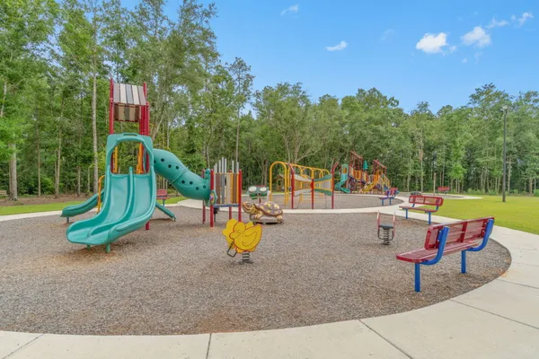 a view of park with swings