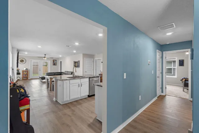 a bedroom with furniture and a window