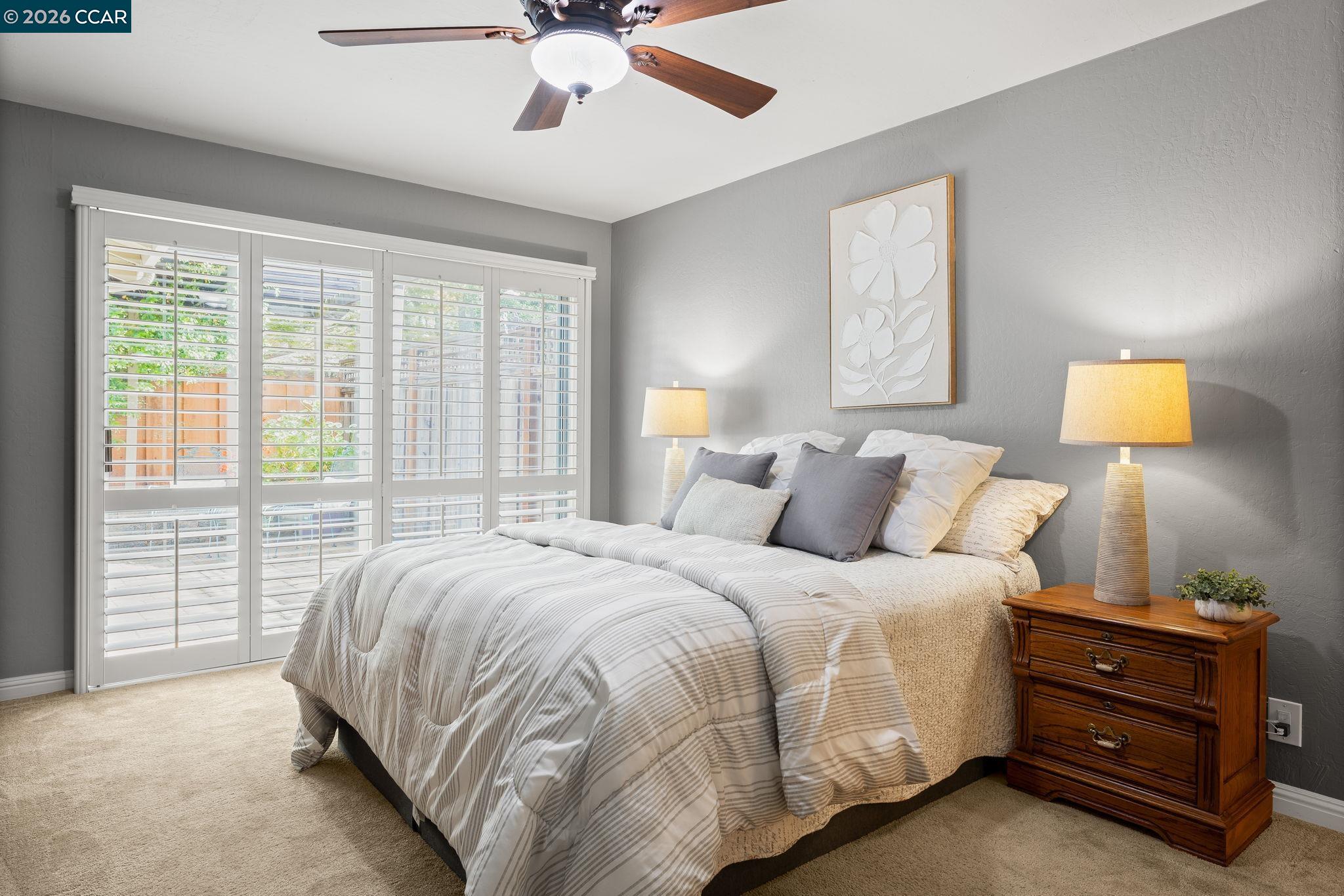 2095 Robb Road Walnut Creek, CA 94596 - Photo 9 of 26 a bedroom with a bed and window