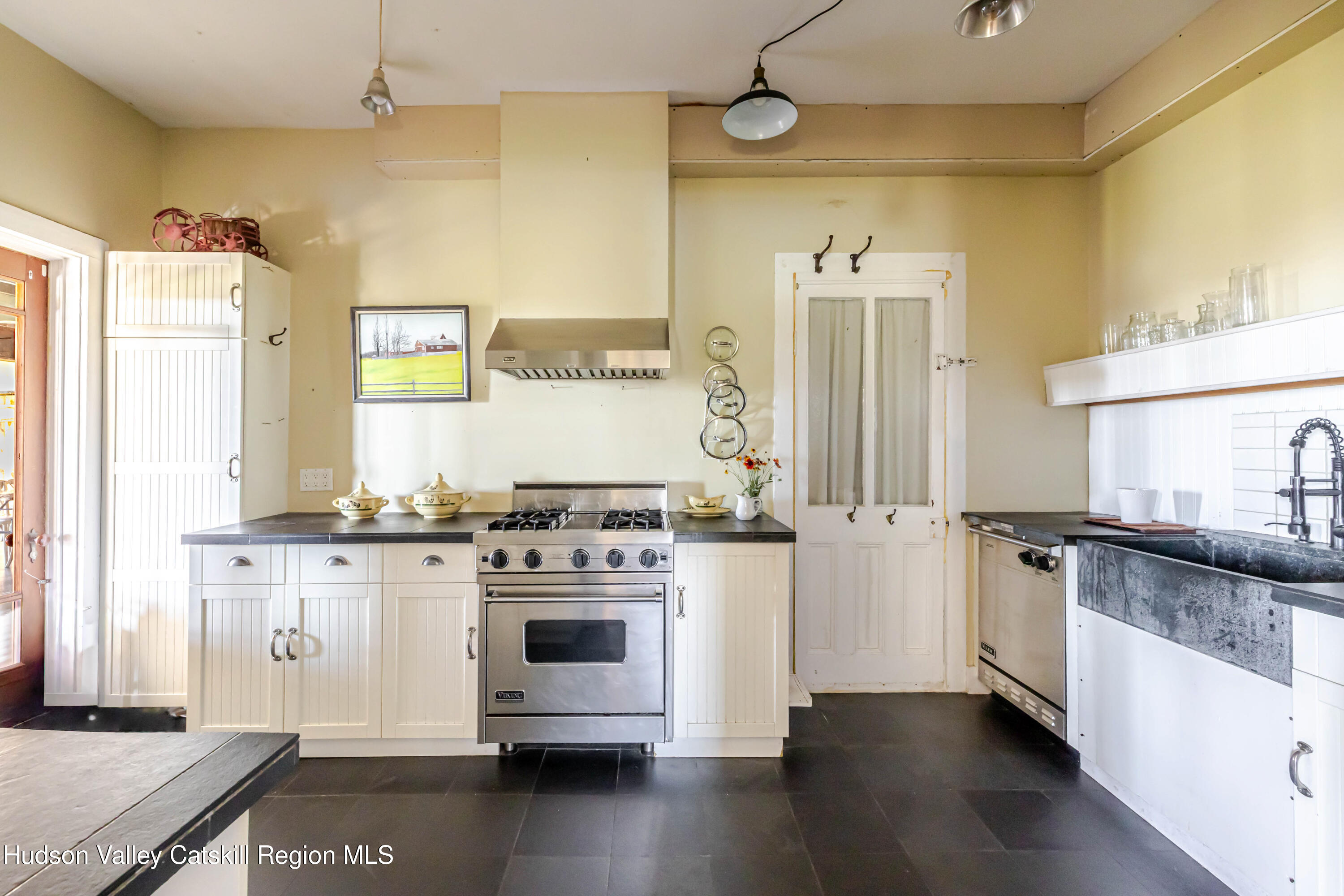 108 HIGH POND Road Summit, NY 12175 - Photo 31 of 82 a kitchen with a stove a sink and a refrigerator