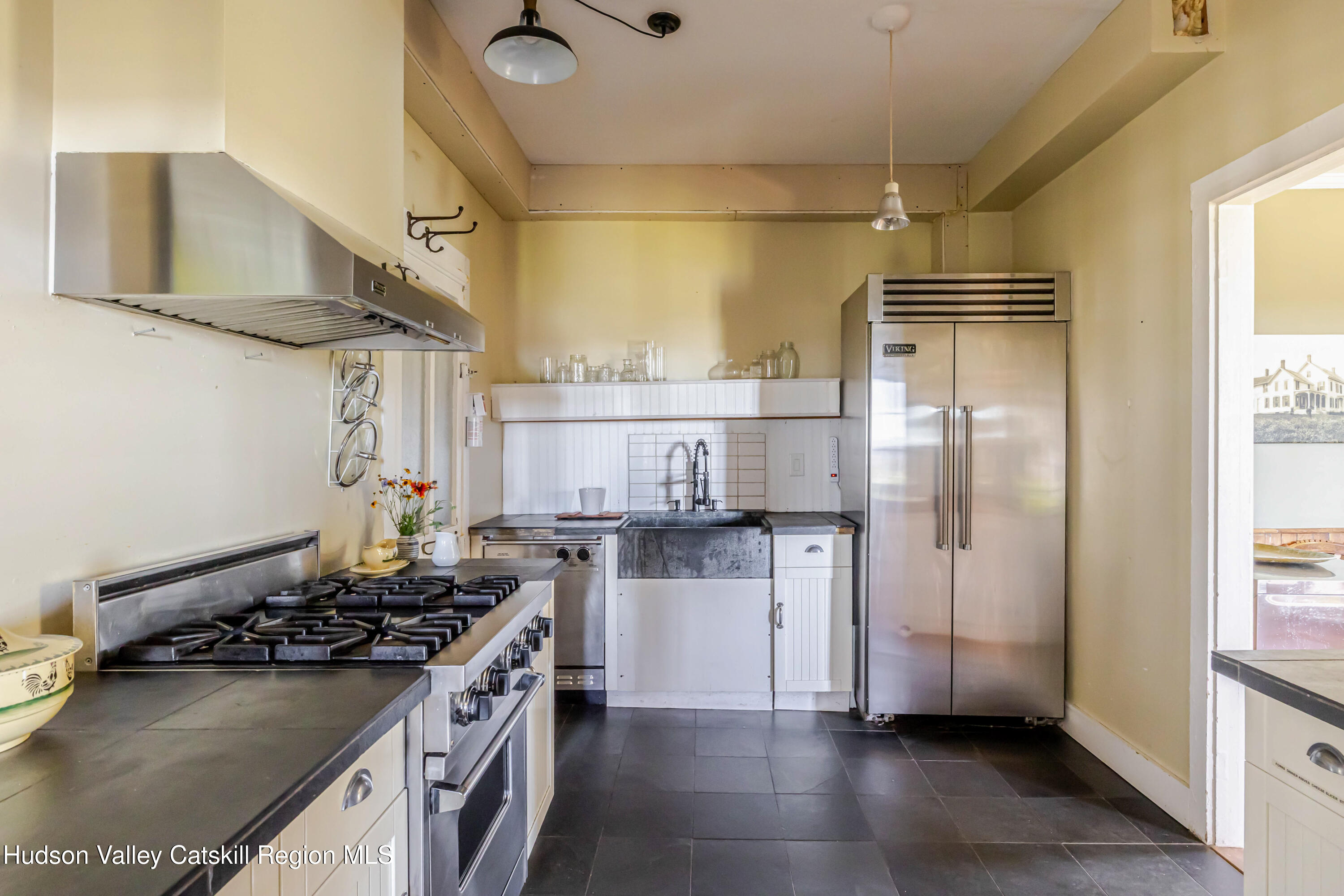108 HIGH POND Road Summit, NY 12175 - Photo 32 of 82 a kitchen with stainless steel appliances granite countertop a stove and a refrigerator