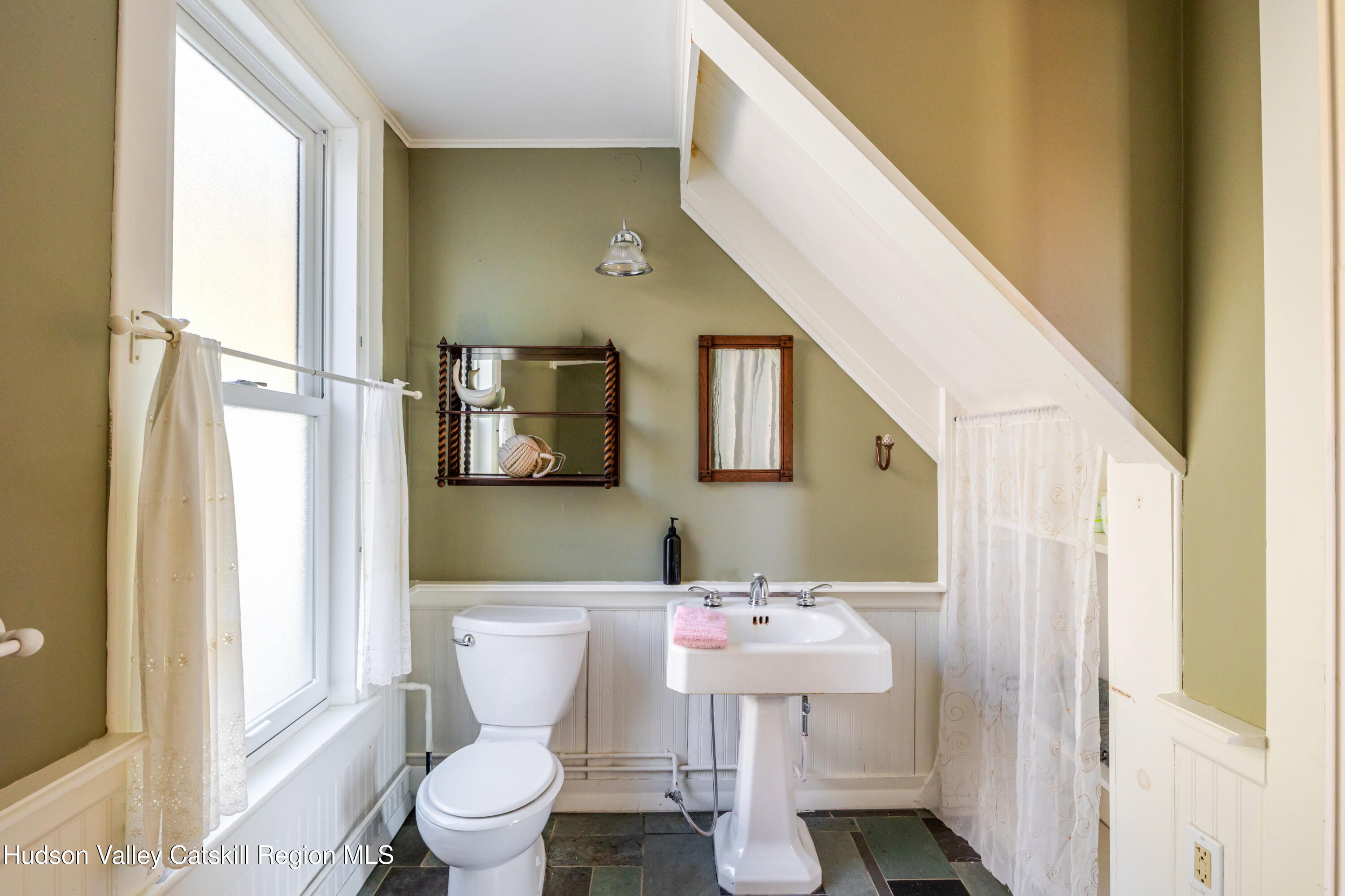 108 HIGH POND Road Summit, NY 12175 - Photo 59 of 82 a bathroom with a sink toilet and mirror