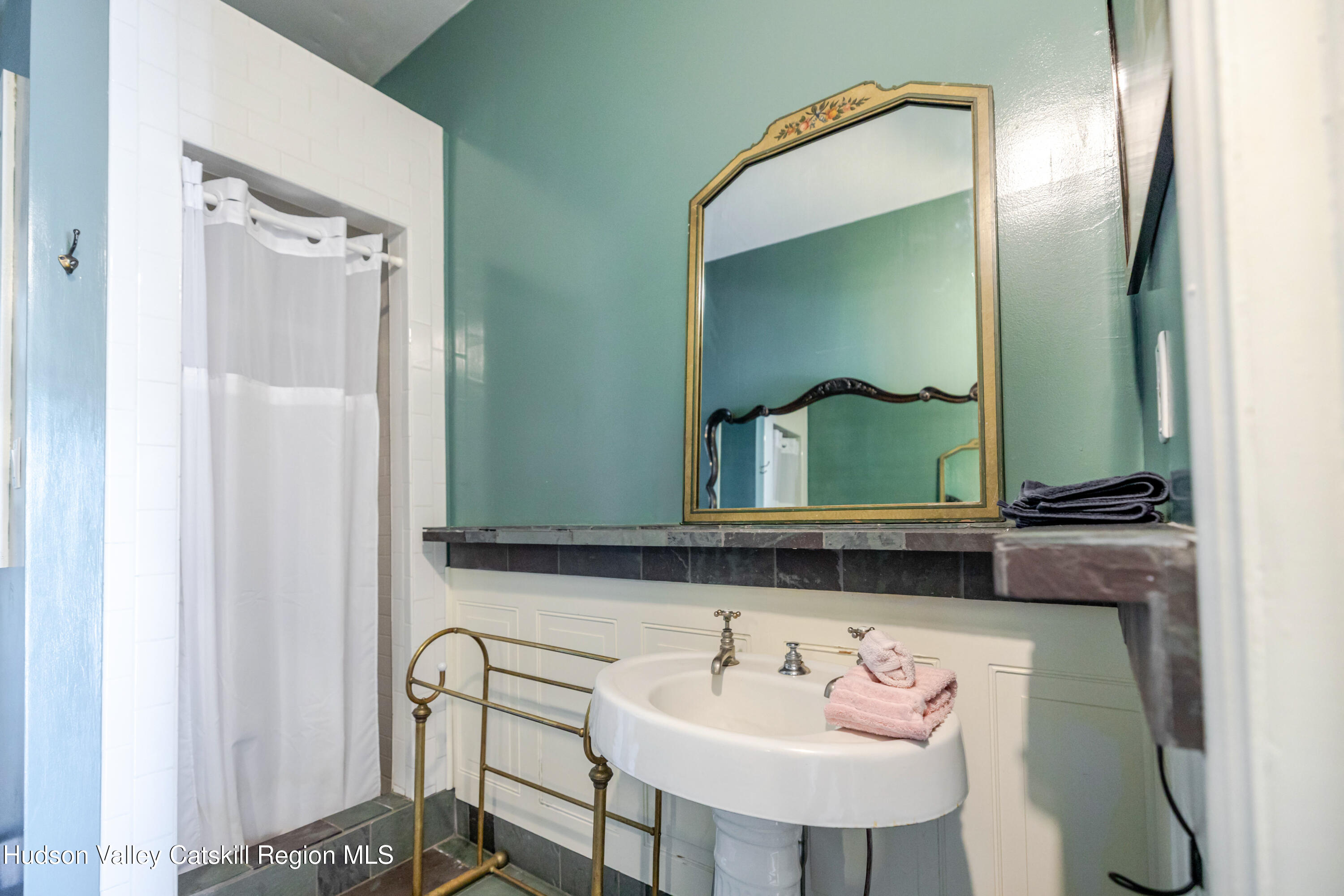 108 HIGH POND Road Summit, NY 12175 - Photo 64 of 82 a bathroom with a sink and a mirror