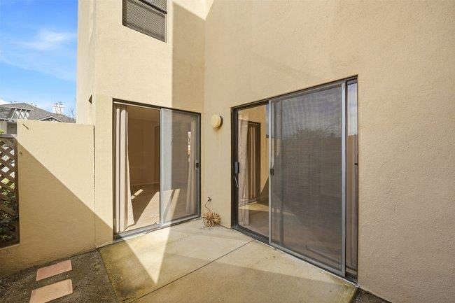 1067 Padre Drive, Unit 2 Salinas, CA 93901 - Photo 19 of 24 a view of a bathroom with a glass door