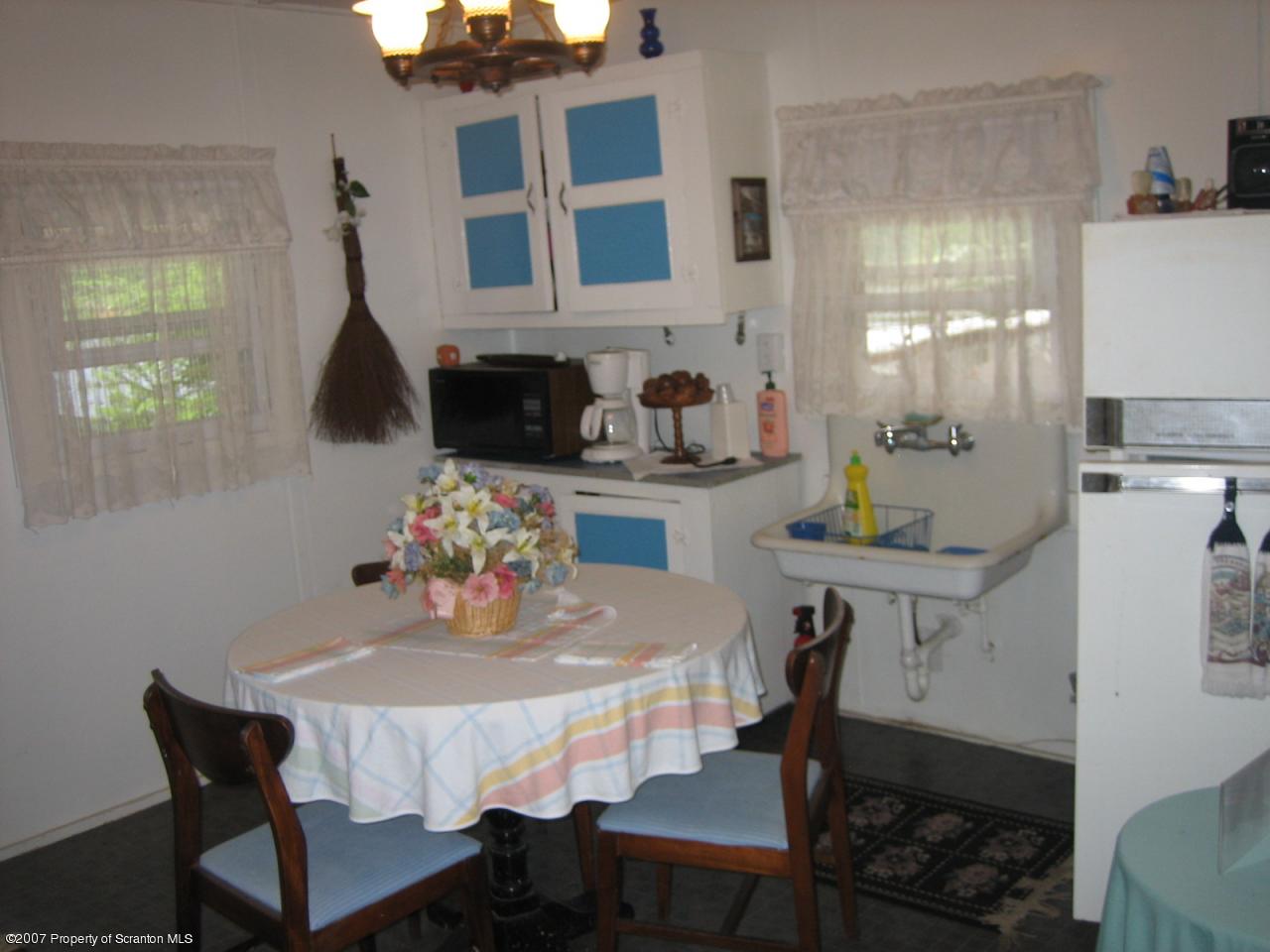 0 Reynolds Road Mansfield, PA 16933 - Photo 6 of 6 a view of a dining room with furniture and window
