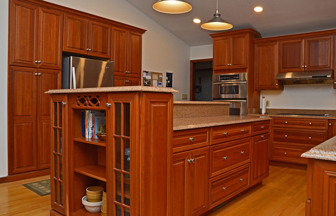 7N201 Stevens Road St. Charles, IL 60175 - Photo 12 of 58 a kitchen with granite countertop wooden cabinets and stainless steel appliances
