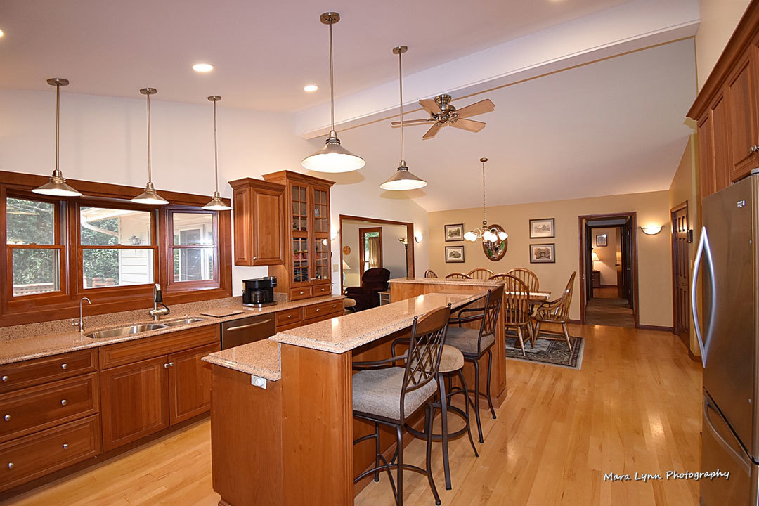 7N201 Stevens Road St. Charles, IL 60175 - Photo 13 of 58 a large kitchen with a table and chairs