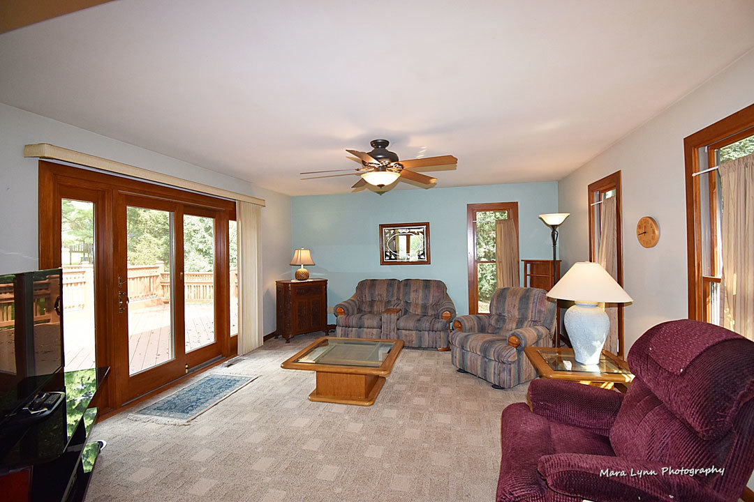 7N201 Stevens Road St. Charles, IL 60175 - Photo 18 of 58 a living room with furniture and a chandelier