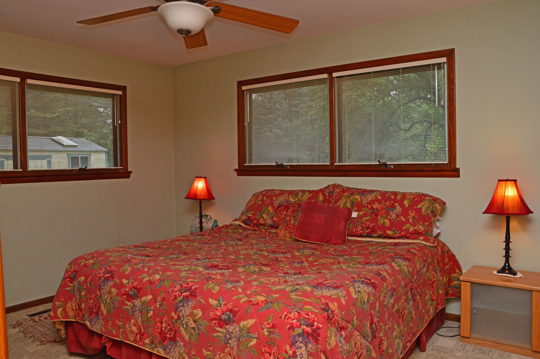 7N201 Stevens Road St. Charles, IL 60175 - Photo 23 of 58 a bedroom with a bed and lamp painting on the wall